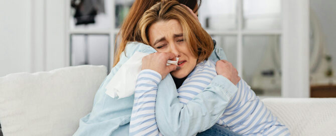A woman with grief needing naturopathic support